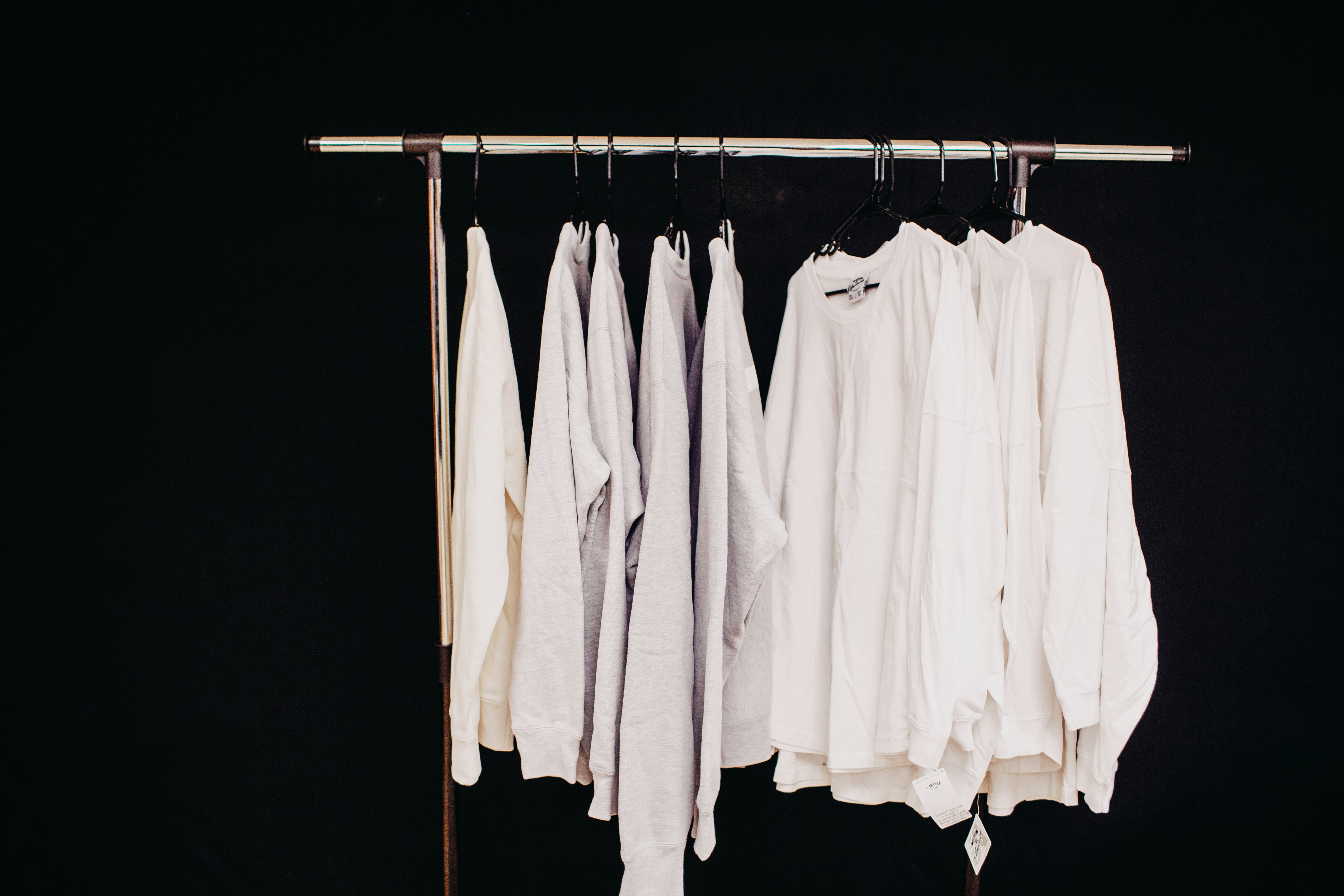multiple unbranded shirts on rack